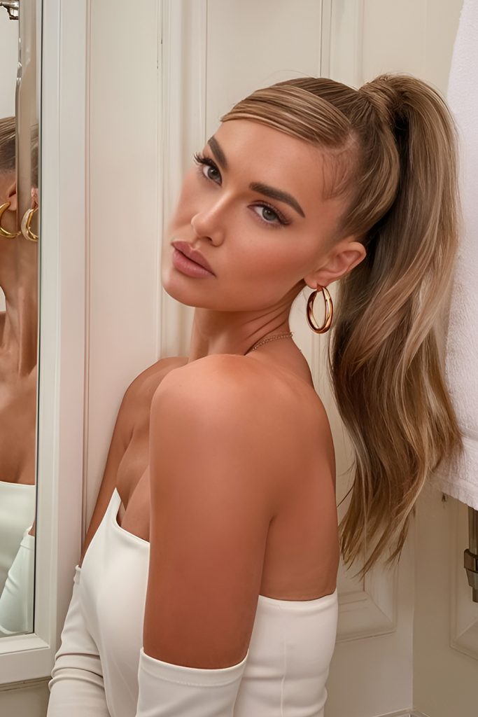 Sleek High Ponytail with Subtle Volume