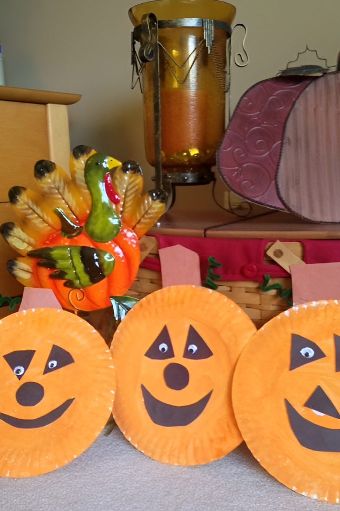 Spooky Paper Plate Pumpkins with Wide Smiles