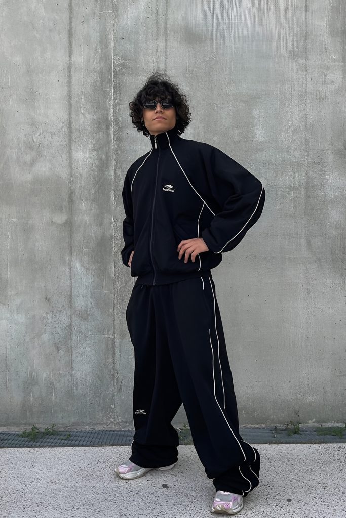 Sport Luxe Streetwear with track pants and a structured top