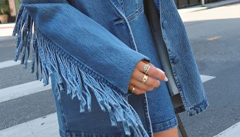 State with a layered fringe and elegant denim