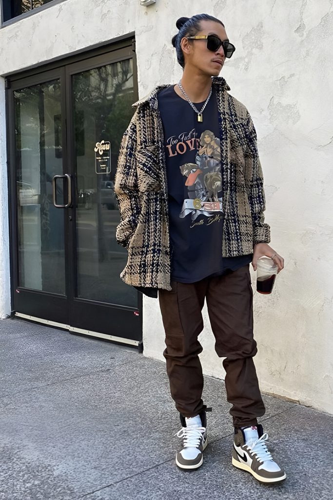 Statement graphic tees with layered outerwear