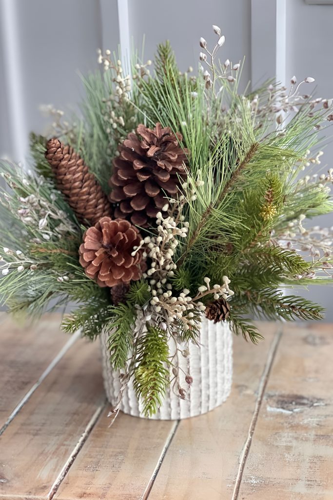Woodland Inspired Centerpieces with Pinecones and Greenery
