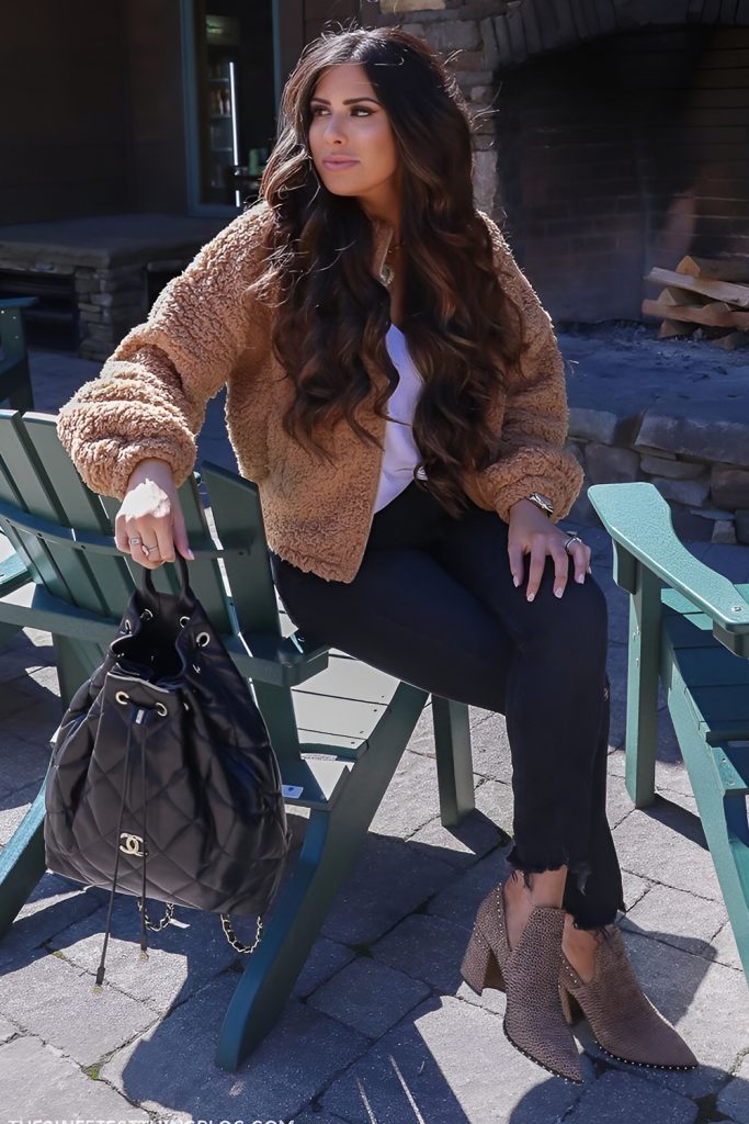 Wrap in rustic comfort with a sherpa jacket and cozy layers