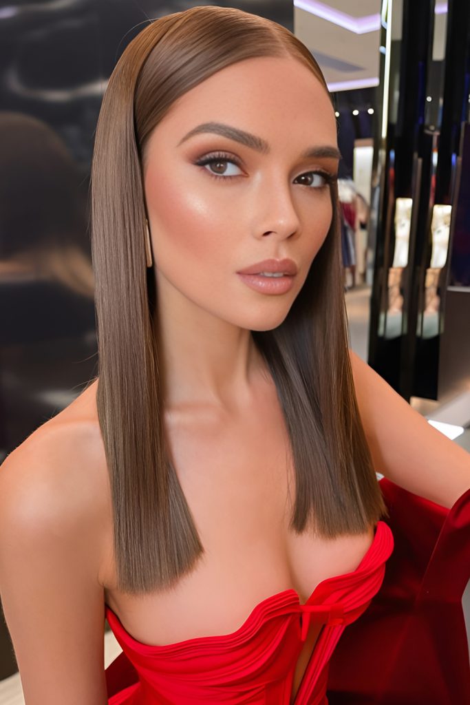 Sleek Straight Hair with a Glossy Part