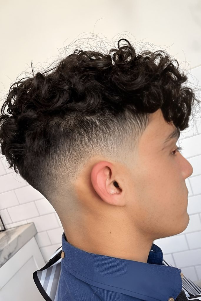 A Curly Fade That Highlights Natural Pattern