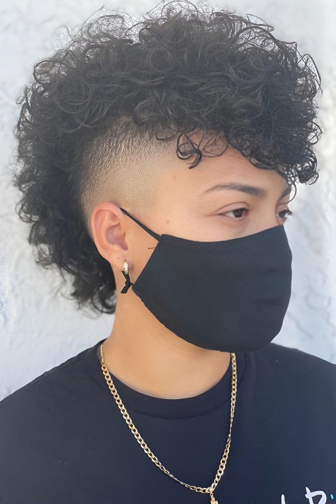 Curly Mohawk With a Sculpted Sharp Fade