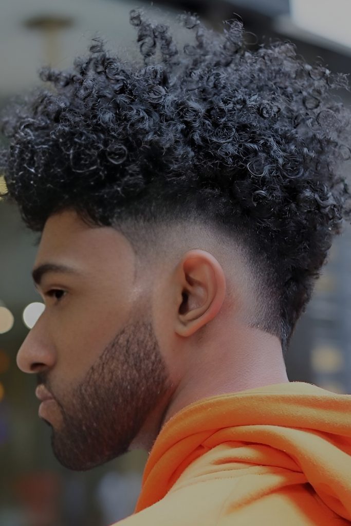 Defined Sharp Fade Under Curly Afro