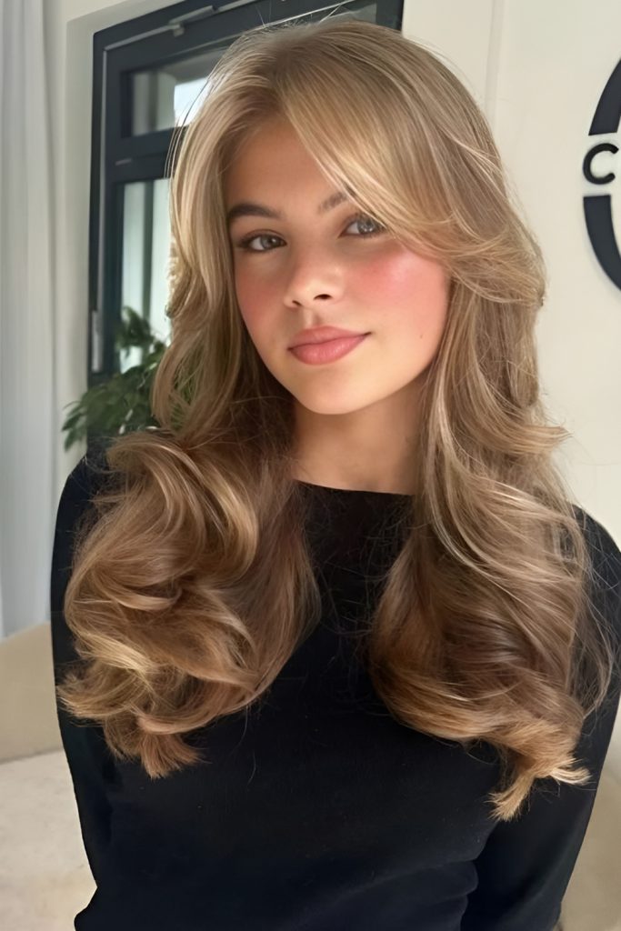Face Framing Blowout Curls That Enhance Features