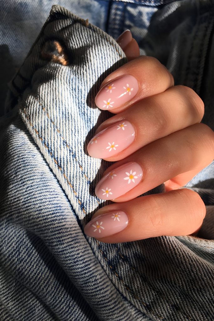 Peachy Nude Nails with Tiny Daisy Accents