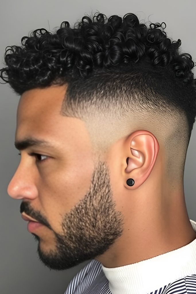 Sharp Fade Supporting a Tight Curly Crop