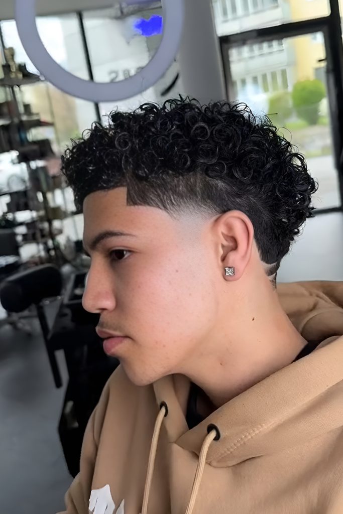 Sharp Taper Fade Keeping Curls Structured