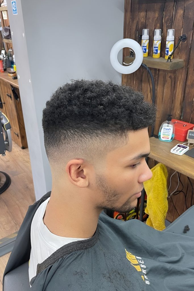 Sharp fade featuring Natural Ringlets