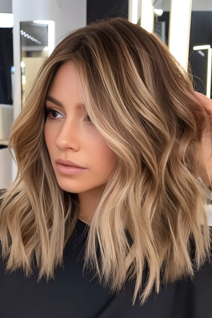Soft Caramel Blonde That Melts into Long Layers