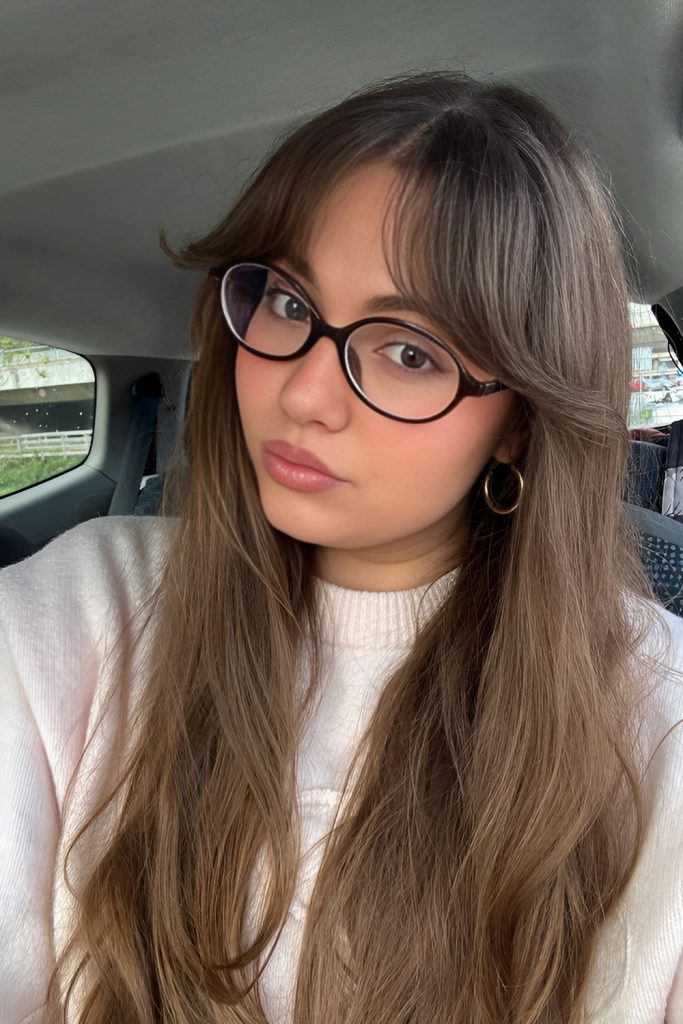 Long Straight Hair with Curtain Bangs and Soft Movement