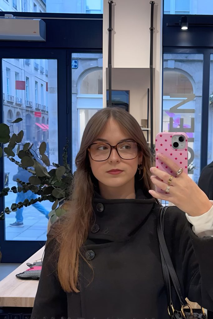 Long Straight Hair with Curtain Bangs and a Youthful Look