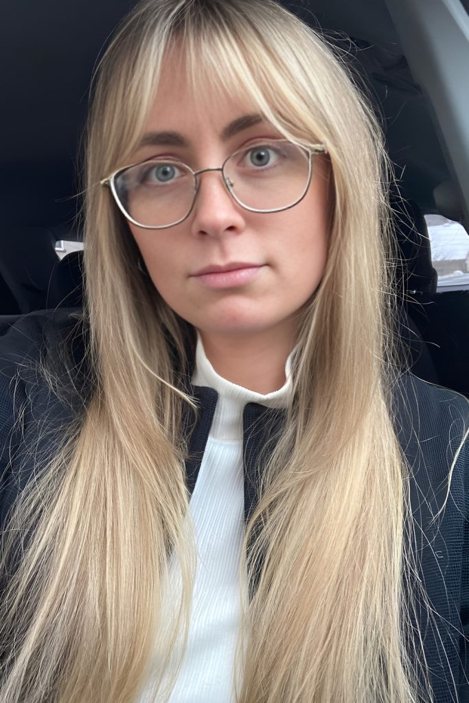 Long Straight Hair with Wispy Curtain Bangs and Glasses