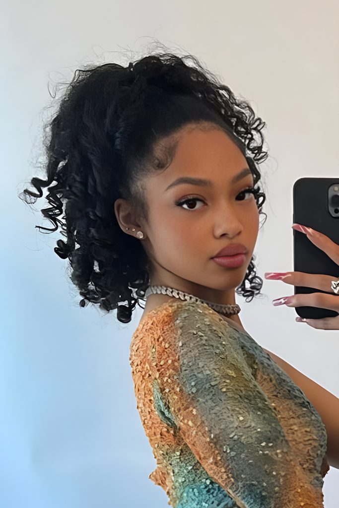 High Curly Ponytail with Texture and Bounce