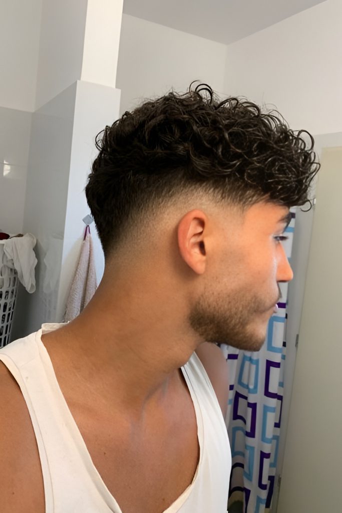 Go Minimal with a Curly Top and Skin Fade