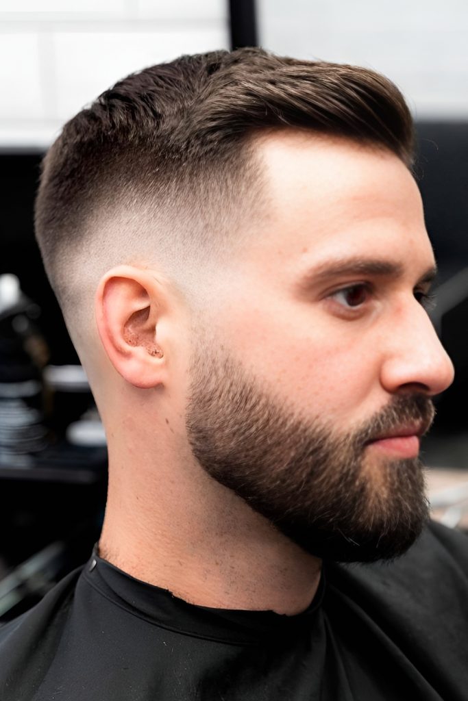 Taper Fade with a Short Beard and Hard Part