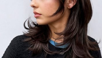 Layered Medium Length Hair With Wispy Side Bangs