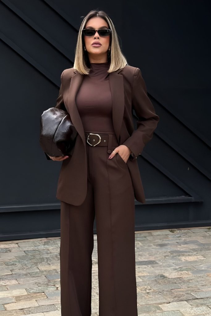 Chocolate brown blazer with matching brown trousers and sunglasses
