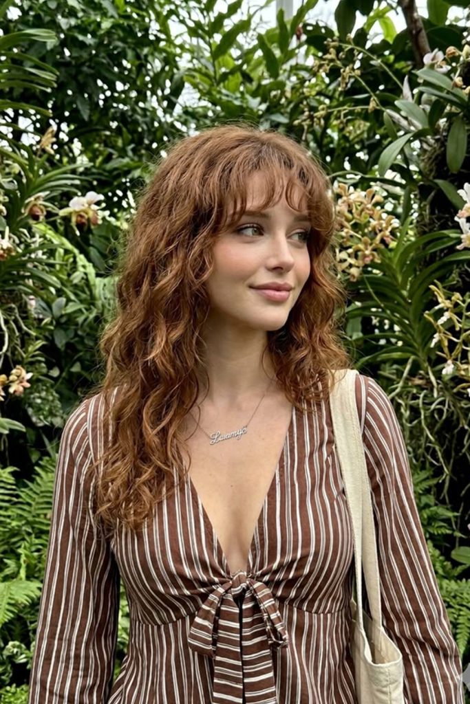 Loose Curls with Romantic Curtain Bangs