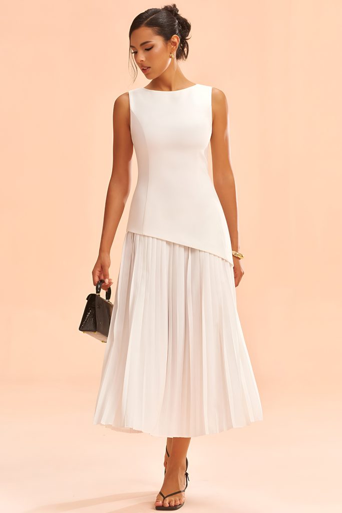 Sleeveless Structured Dresses with Polished Accessories