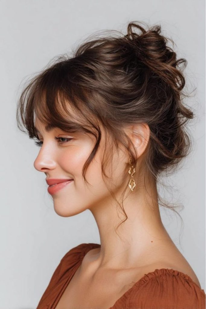 Wispy Bangs With a Low Bun