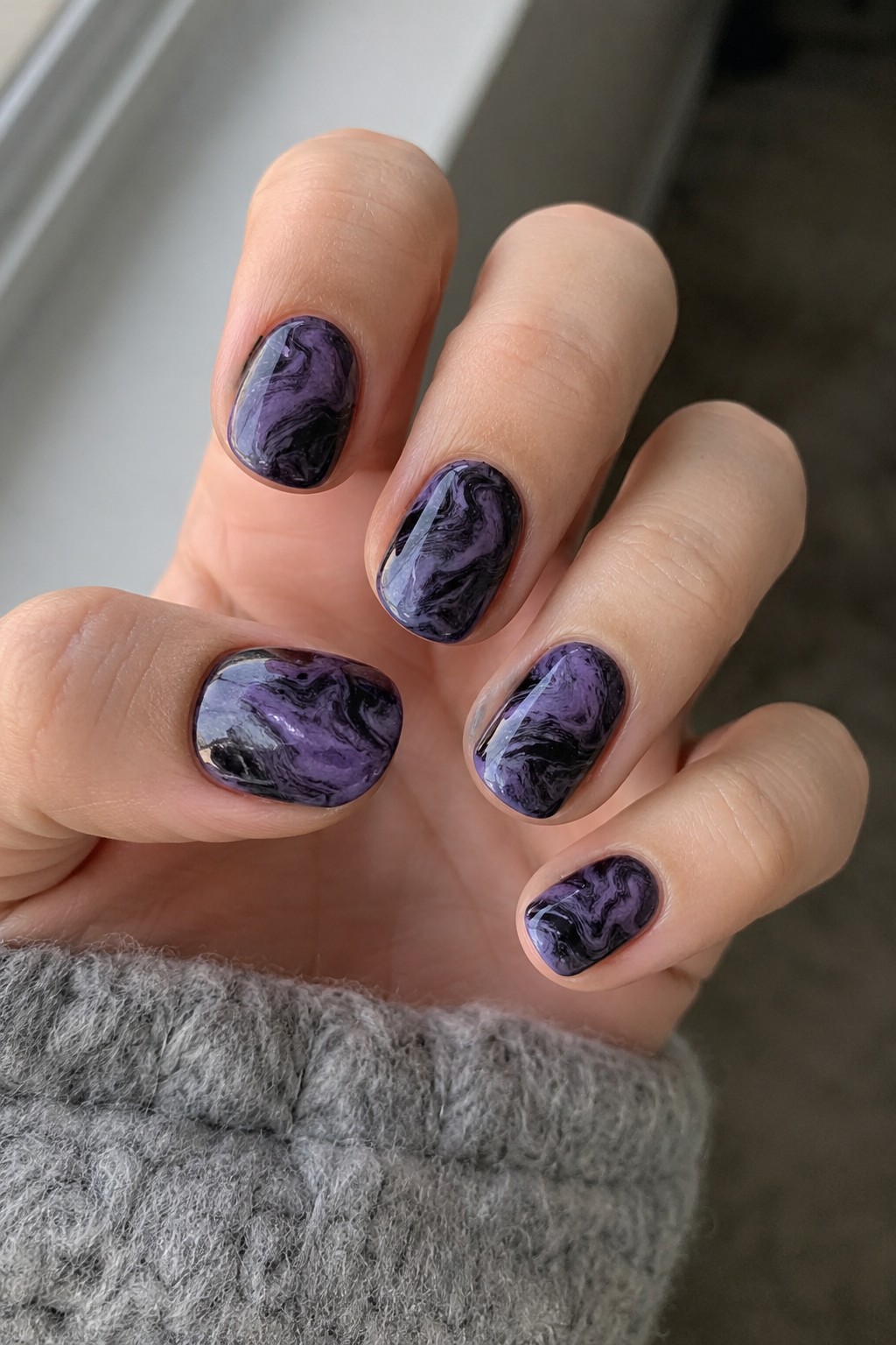 Witchy Purple Marble Halloween nail design 2026