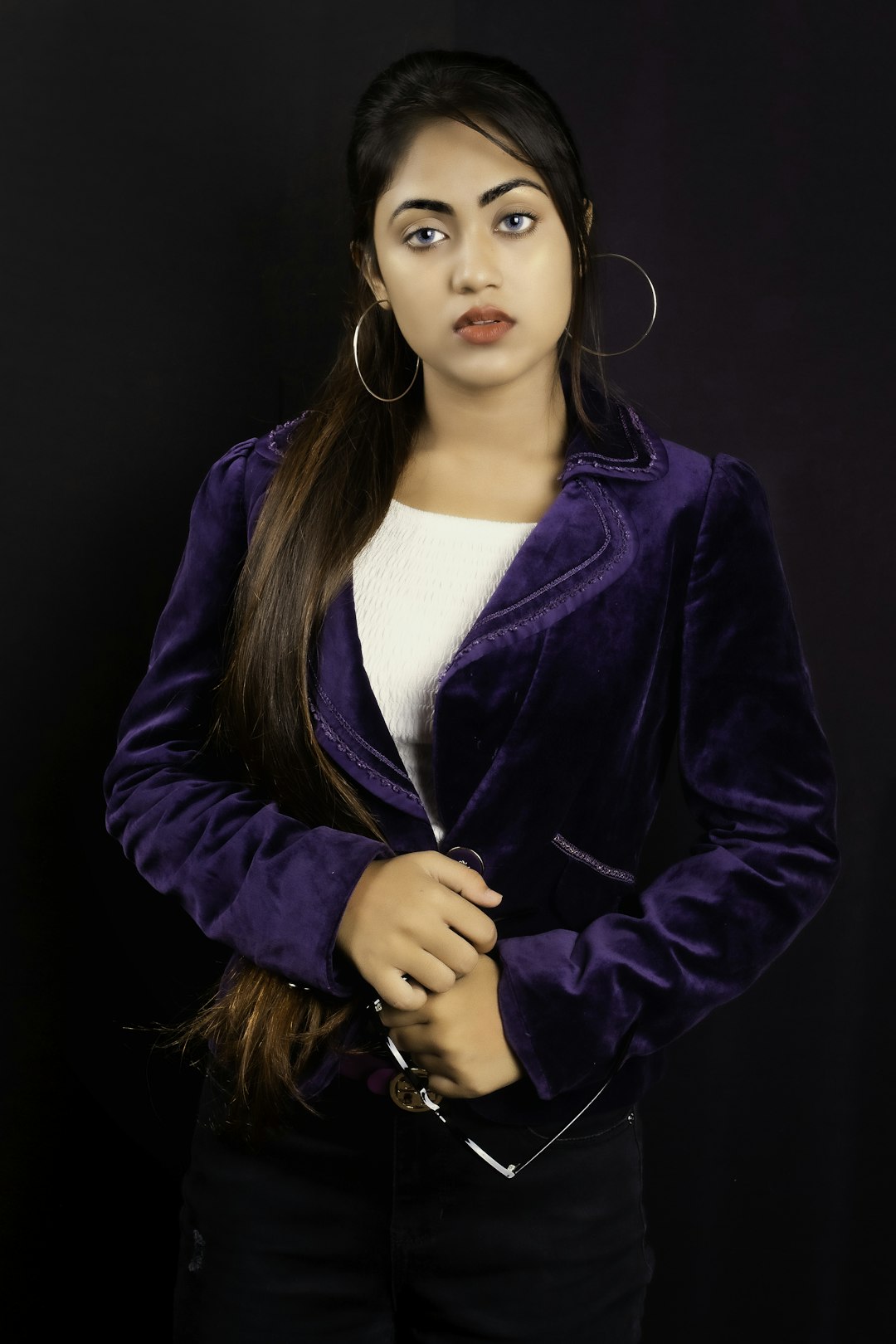 Woman in a blue blazer smiling