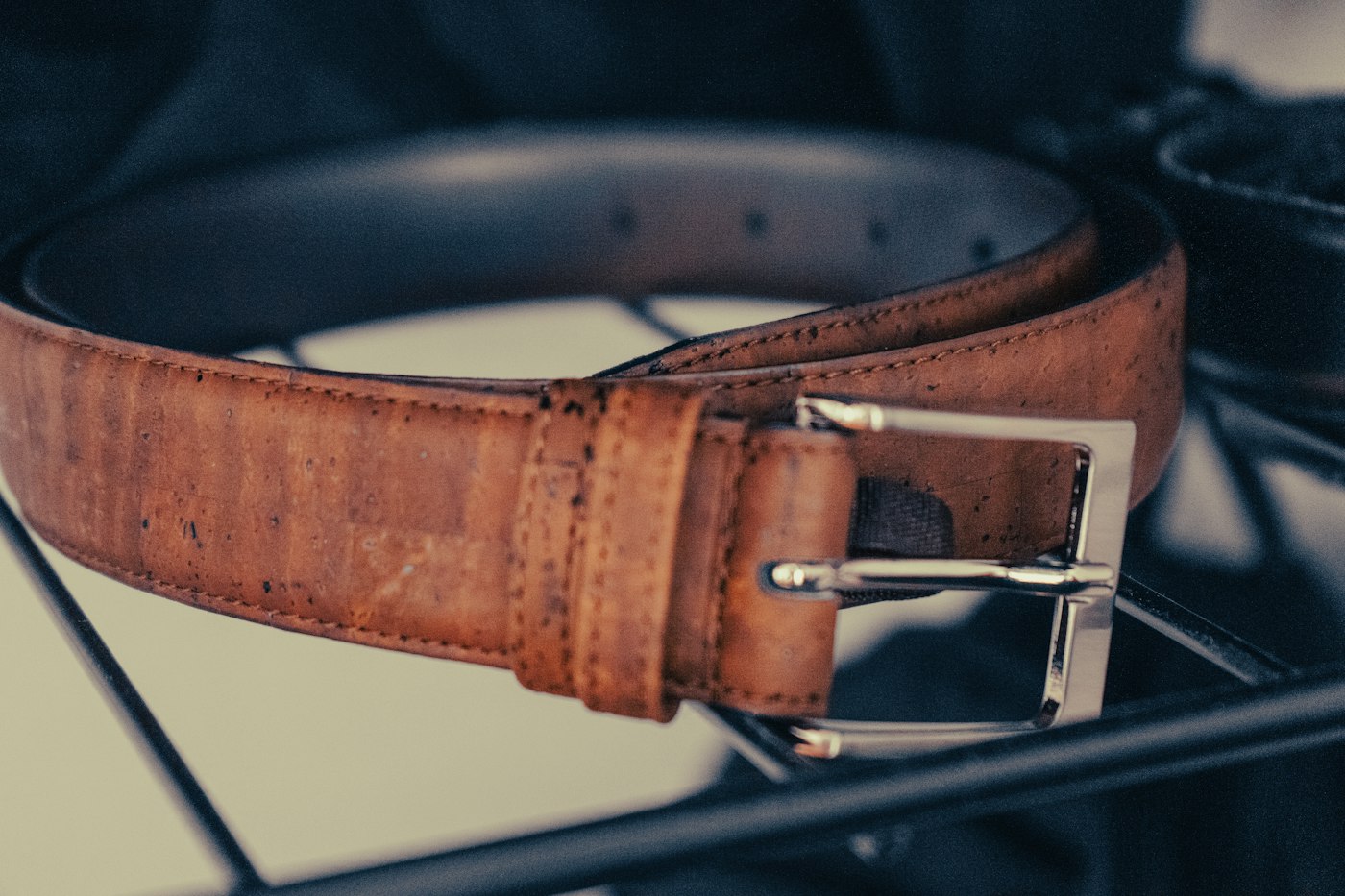 Brown leather belt with a silver buckle