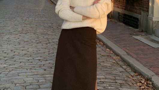 chocolate brown long skirt ivory turtleneck tall boots brick street