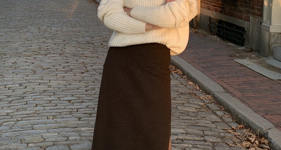 chocolate brown long skirt ivory turtleneck tall boots brick street