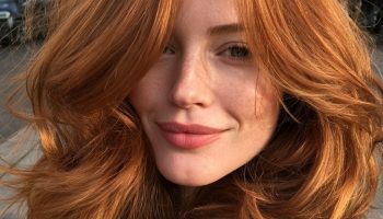 copper hair color soft waves camel coat