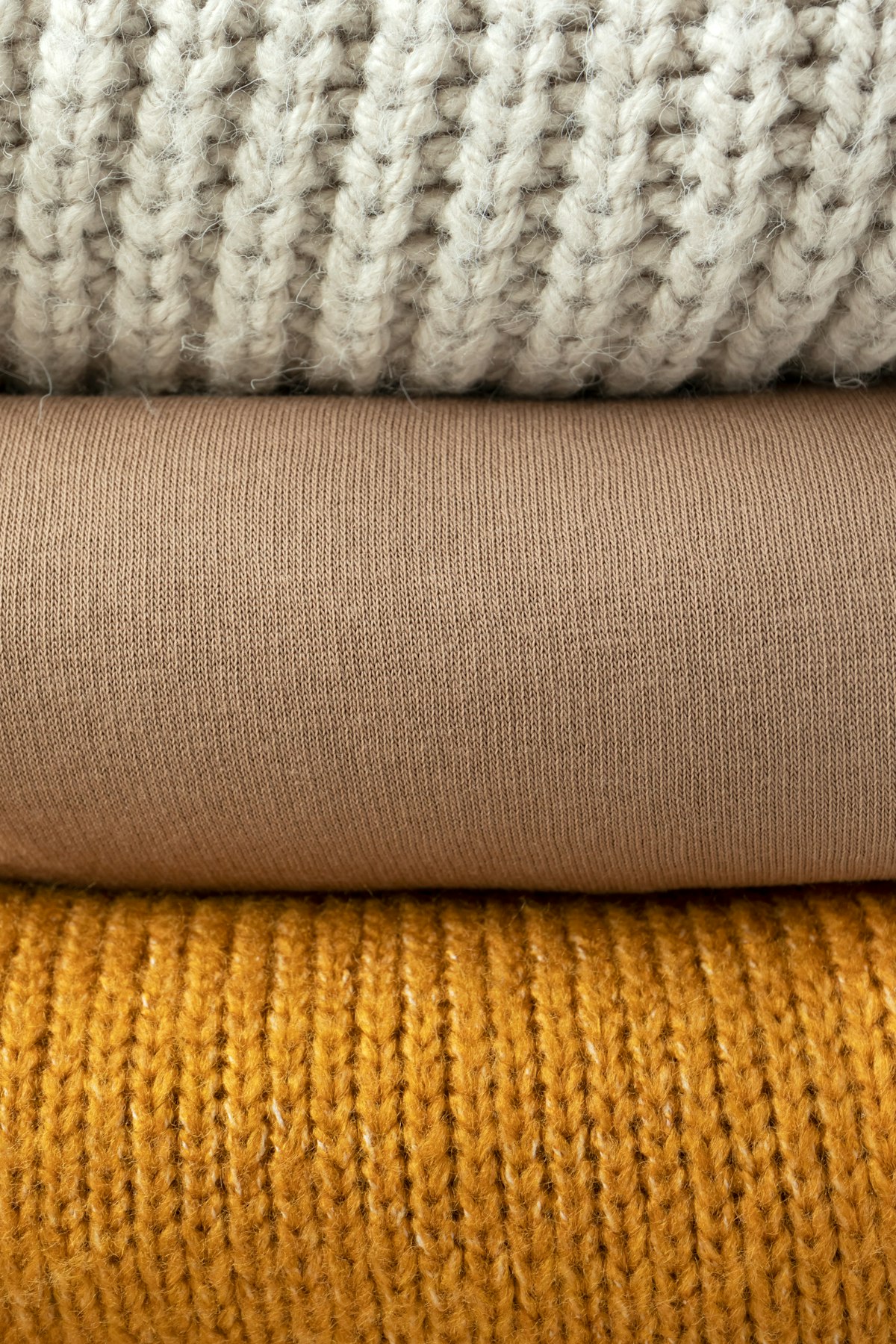 Close up of a grey and white knit fabric
