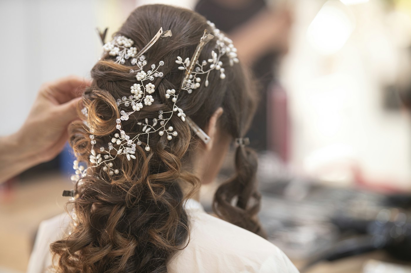 Woman with a floral hair tie in her hair