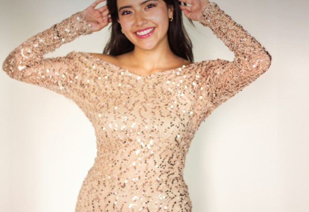 Gold sequin halter mini dress styled for a holiday party