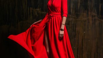 Woman in a red dress, styled for a new years eve outfit