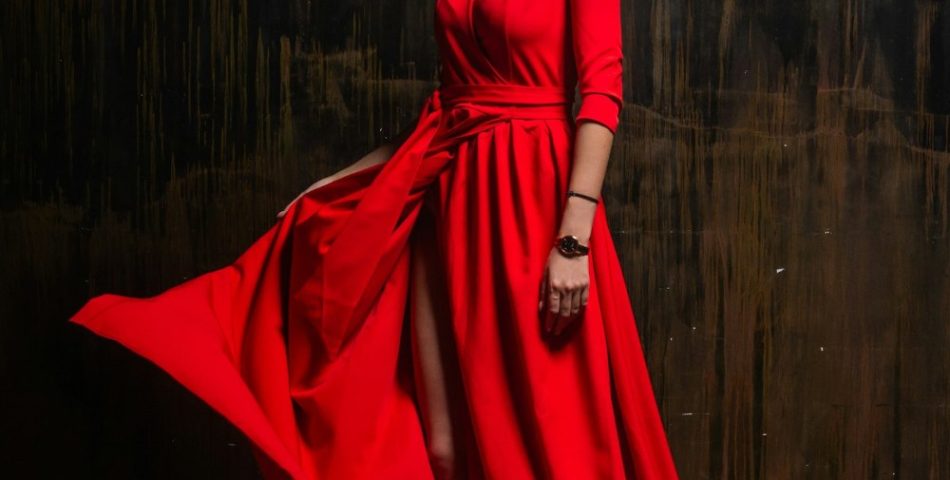 Woman in a red dress, styled for a new years eve outfit
