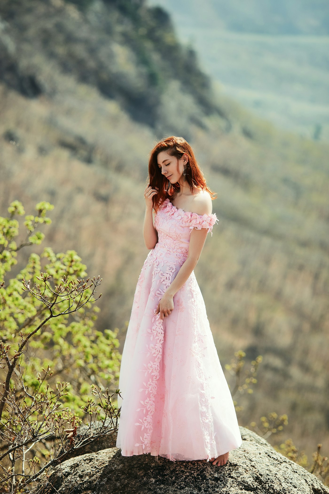 Woman in a pink dress outdoors