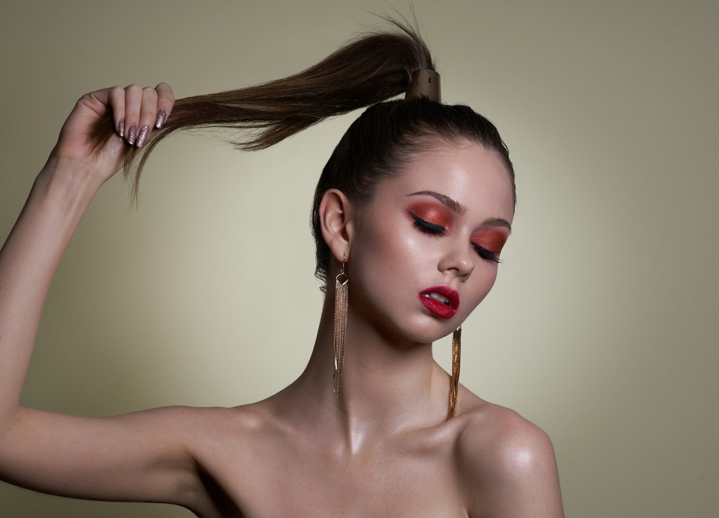 Woman with red lipstick and a ponytail