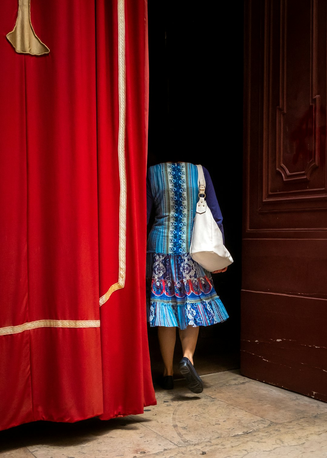Woman wearing a blue multicolored dress