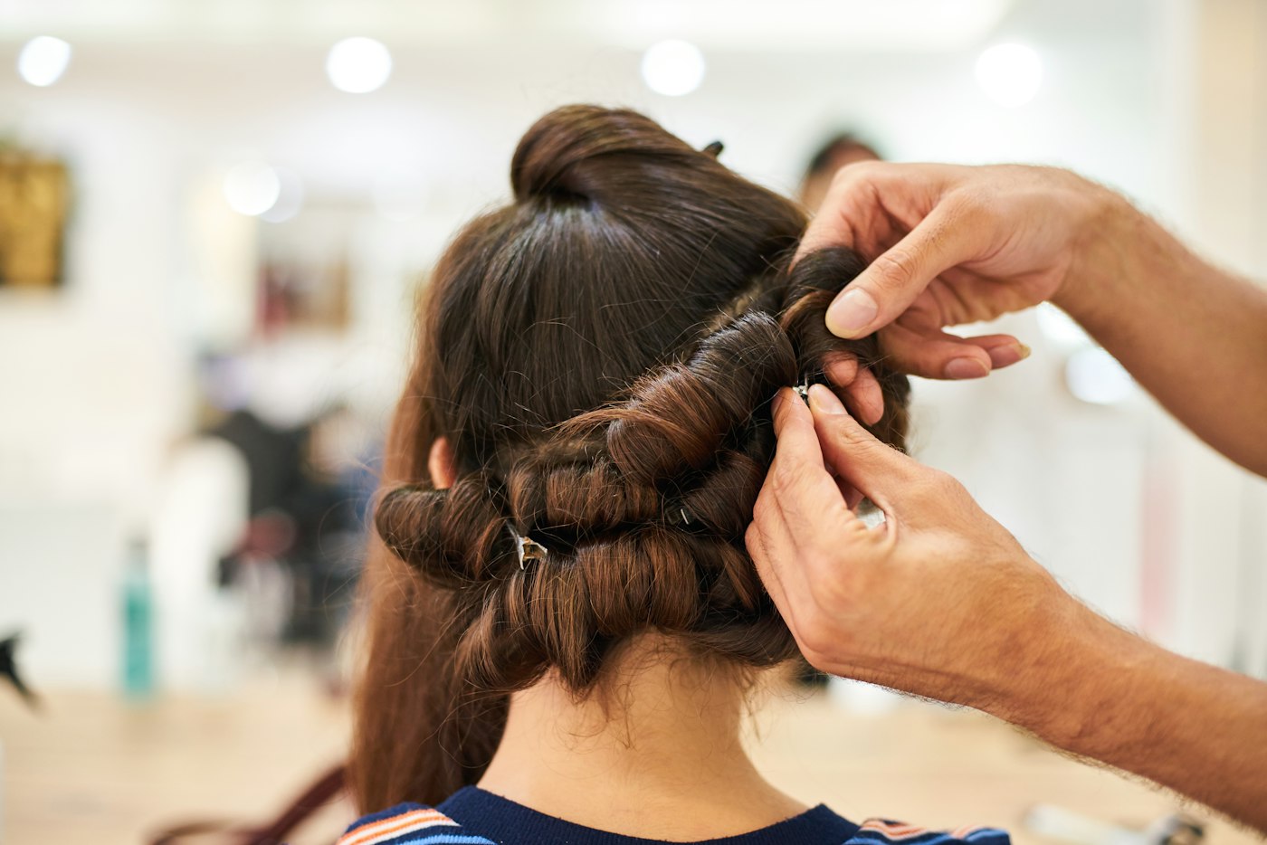 Woman holding her hair to one side
