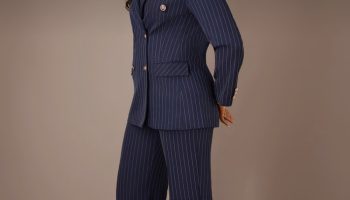 Woman in a navy pinstripe suit as inspiration for wearing vintage tailoring