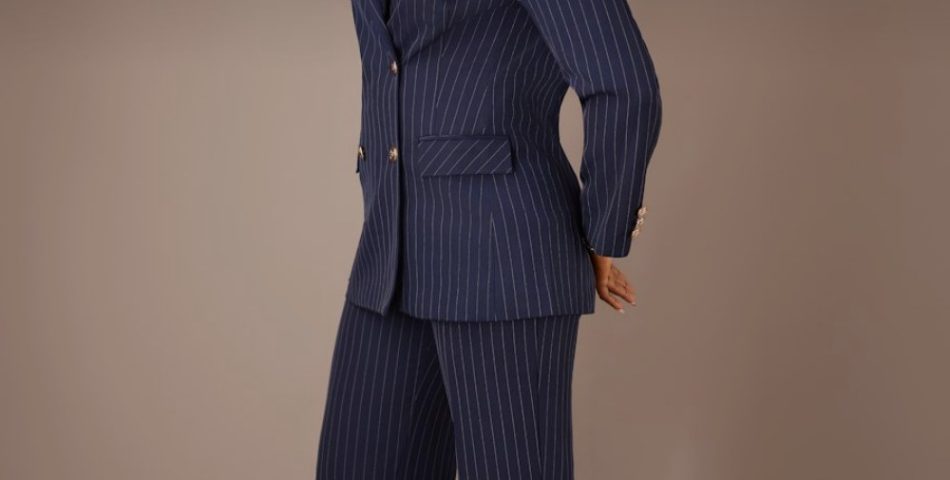 Woman in a navy pinstripe suit as inspiration for wearing vintage tailoring