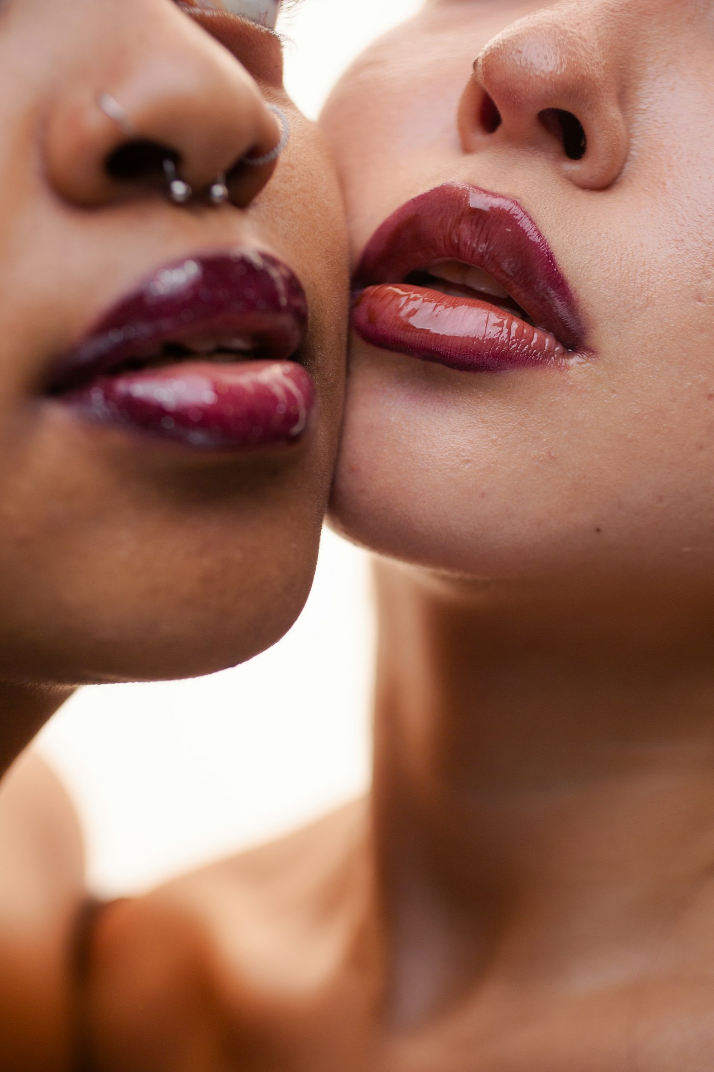 Close up of glossy lips with a sheer lipstick