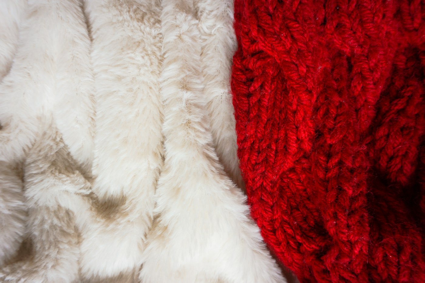 White fluffy texture on a red fabric