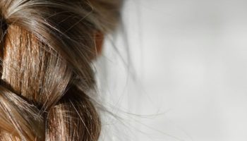 Woman with a long braid over her shoulder