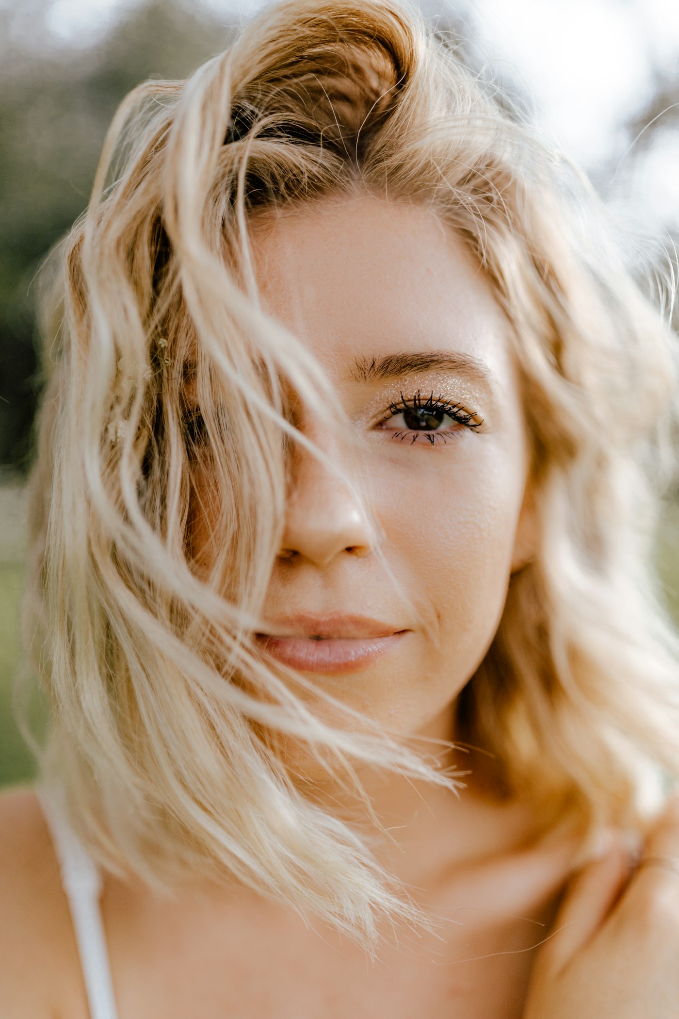 Woman with blonde hair and brown eyes